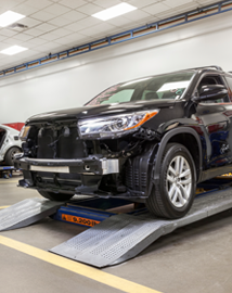 Toyota on vehicle lift | Valley Hi Toyota in Victorville CA