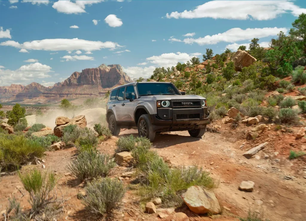 Toyota Land Cruiser Driving Through a Desert